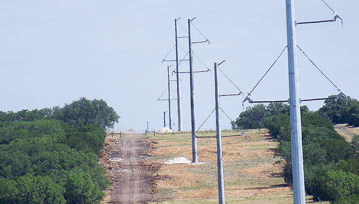 a row of power line poles